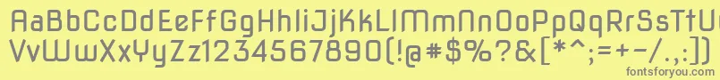 Novasquare-fontti – harmaat kirjasimet keltaisella taustalla