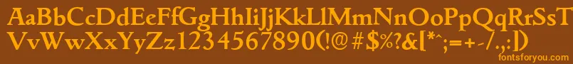 フォントGouditaserialBold – オレンジ色の文字が茶色の背景にあります。