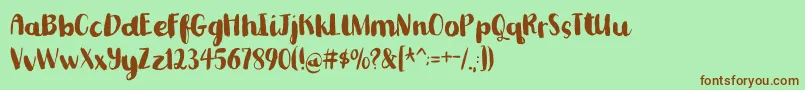 Шрифт Romkugledemo – коричневые шрифты на зелёном фоне