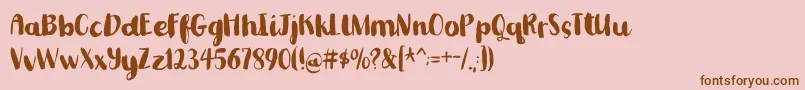 Шрифт Romkugledemo – коричневые шрифты на розовом фоне