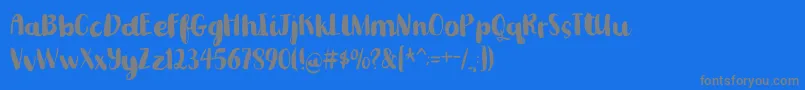 Romkugledemo-fontti – harmaat kirjasimet sinisellä taustalla
