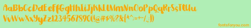 Romkugledemo Font – Orange Fonts on Green Background