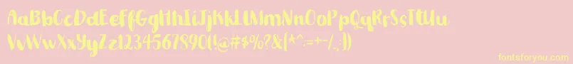 Romkugledemo-fontti – keltaiset fontit vaaleanpunaisella taustalla