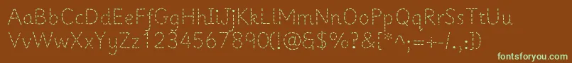 フォントPrima1 – 緑色の文字が茶色の背景にあります。
