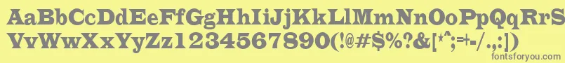 フォントEvitaultracondensedRegular – 黄色の背景に灰色の文字