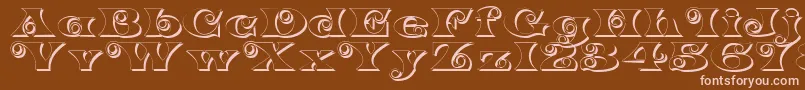 K22SpiralSwashShadow Font – Pink Fonts on Brown Background