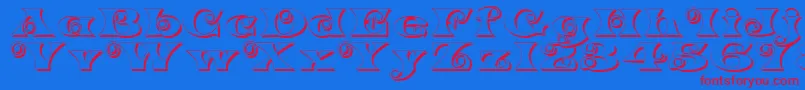 K22SpiralSwashShadow Font – Red Fonts on Blue Background