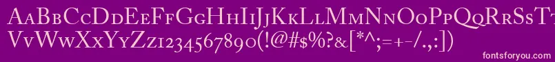 Czcionka AdobeCaslonRegularSmallCapsOldstyleFigures – różowe czcionki na fioletowym tle