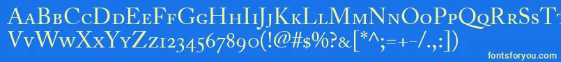 Czcionka AdobeCaslonRegularSmallCapsOldstyleFigures – żółte czcionki na niebieskim tle