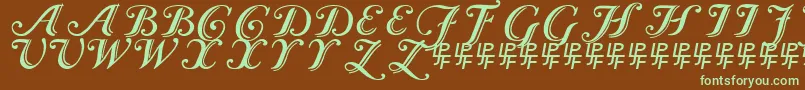 フォントCaslonCalligraphicInitials – 緑色の文字が茶色の背景にあります。