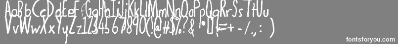 フォントThedogatemyhomeworkbold – 灰色の背景に白い文字