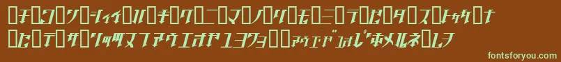 フォントGolgothaObliqueJ. – 緑色の文字が茶色の背景にあります。