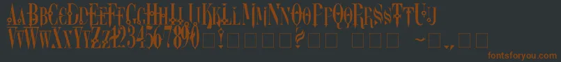 Dreamscarc-Schriftart – Braune Schriften auf schwarzem Hintergrund