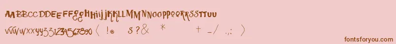 Шрифт Vtkssquizita – коричневые шрифты на розовом фоне