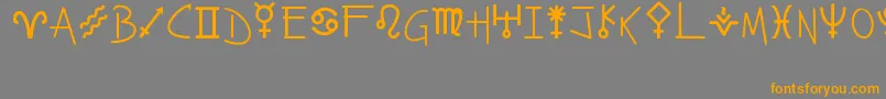 フォントZahstrology – オレンジの文字は灰色の背景にあります。