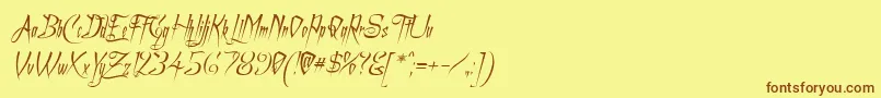 フォントACharmingFontItalic – 茶色の文字が黄色の背景にあります。