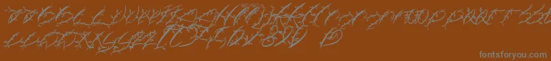 FtfLeafyLopstonesia Font – Gray Fonts on Brown Background