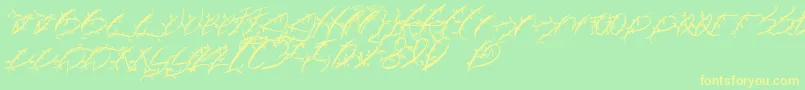 フォントFtfLeafyLopstonesia – 黄色の文字が緑の背景にあります
