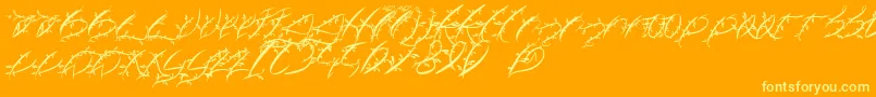 FtfLeafyLopstonesia-Schriftart – Gelbe Schriften auf orangefarbenem Hintergrund