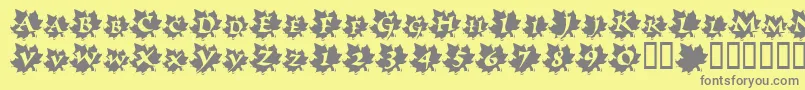 MapleLeafRag-fontti – harmaat kirjasimet keltaisella taustalla