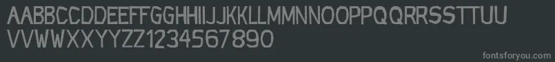 Fonte CfrockageRegular – fontes cinzas em um fundo preto