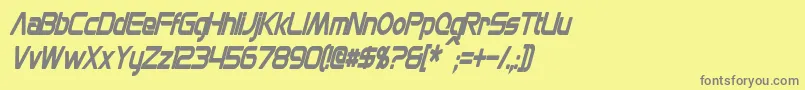 MonsOlympiaCondensedBoldItalic-fontti – harmaat kirjasimet keltaisella taustalla