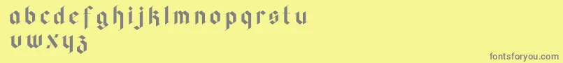 フォントFaghagblack2 – 黄色の背景に灰色の文字
