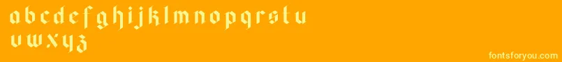 Faghagblack2-Schriftart – Gelbe Schriften auf orangefarbenem Hintergrund