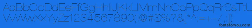 HelveticaLt23UltraLightExtended-fontti – mustat fontit sinisellä taustalla
