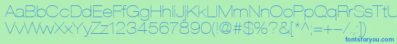 HelveticaLt23UltraLightExtended-Schriftart – Blaue Schriften auf grünem Hintergrund