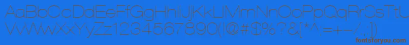 HelveticaLt23UltraLightExtended Font – Brown Fonts on Blue Background
