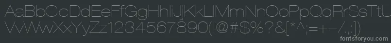 HelveticaLt23UltraLightExtended-fontti – harmaat kirjasimet mustalla taustalla