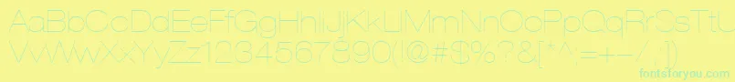HelveticaLt23UltraLightExtended-Schriftart – Grüne Schriften auf gelbem Hintergrund