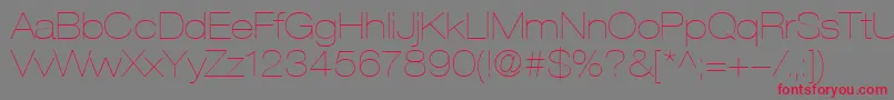 HelveticaLt23UltraLightExtended Font – Red Fonts on Gray Background