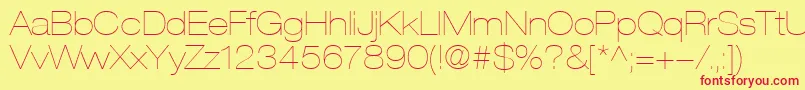 HelveticaLt23UltraLightExtended-fontti – punaiset fontit keltaisella taustalla