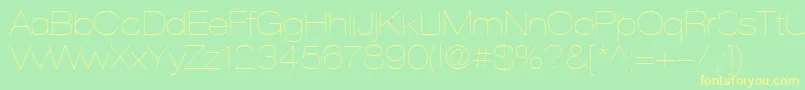 Czcionka HelveticaLt23UltraLightExtended – żółte czcionki na zielonym tle
