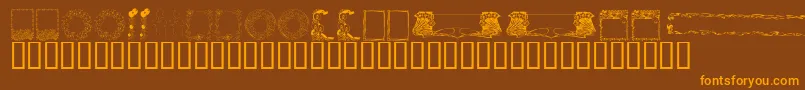 KrFabFramesAndBorders Font – Orange Fonts on Brown Background