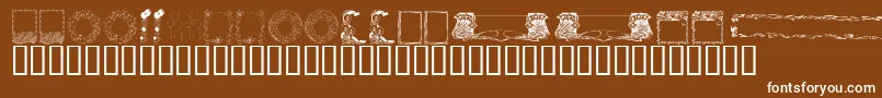 KrFabFramesAndBorders Font – White Fonts on Brown Background