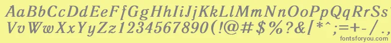 フォントAntiqua8 – 黄色の背景に灰色の文字