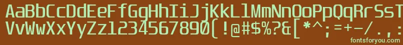 フォントUnispaceRg – 緑色の文字が茶色の背景にあります。