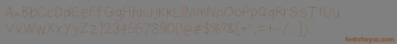フォントFilamentfive – 茶色の文字が灰色の背景にあります。
