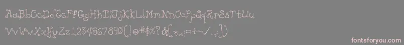 フォントLikecockatooscondensed – 灰色の背景にピンクのフォント