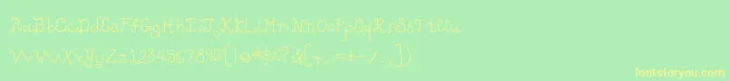 フォントLikecockatooscondensed – 黄色の文字が緑の背景にあります