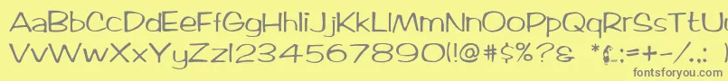 フォントTicard – 黄色の背景に灰色の文字