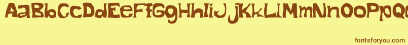 ManoAlzada Font – Brown Fonts on Yellow Background