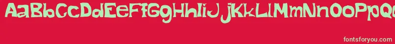 ManoAlzada Font – Green Fonts on Red Background