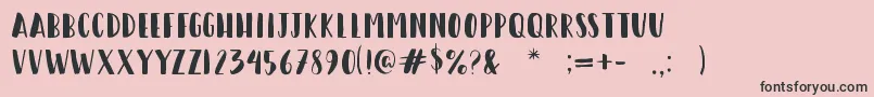 fuente HappyCamperRegular – Fuentes Negras Sobre Fondo Rosa