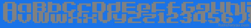 LvdcGameOver2-fontti – harmaat kirjasimet sinisellä taustalla