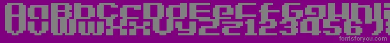 LvdcGameOver2-fontti – harmaat kirjasimet violetilla taustalla