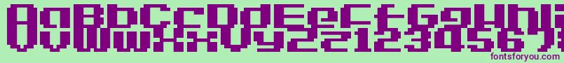 LvdcGameOver2-fontti – violetit fontit vihreällä taustalla